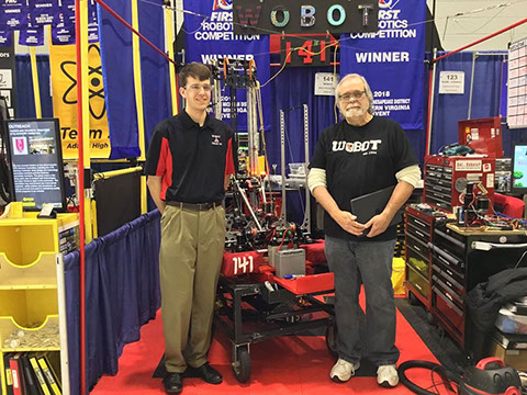 On Dean's List winner Drew with his mentor, Pat Lamotte, in the pit before his interview for the next level.
