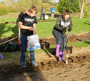 Two Students Planting