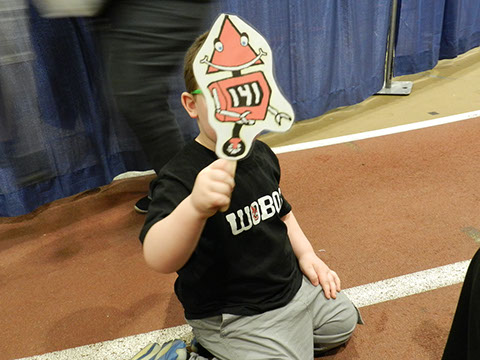 One of our team parents made and brought a bunch of signs with our mascot on to cheer the team on with.